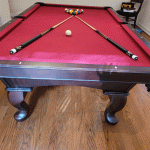 Claw-foot-pool-table-with-burgundy-felt a plus billiards