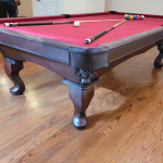 Claw-foot-pool-table-with-burgundy-felt-slant a plus billiards